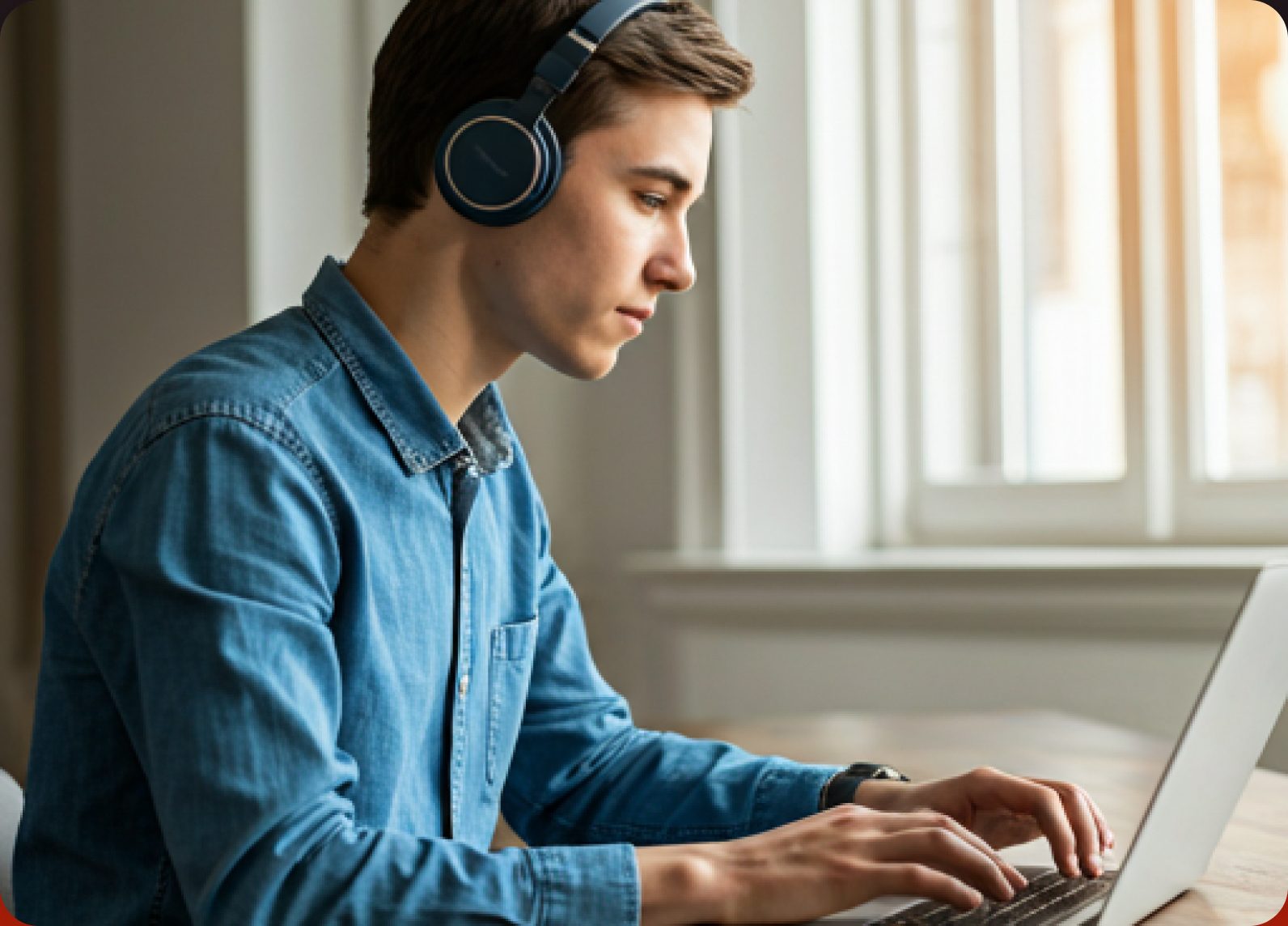 Student practicing language exercises on a laptop